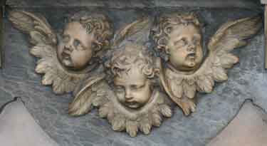 group of 3 cherub heads
