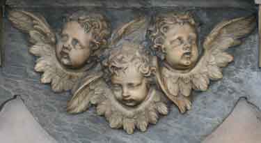 group of 3 cherub heads